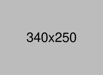 Students using tablets in a classroom, highlighting digital learning.