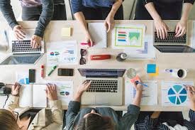 Parent and child interacting positively with a school notification on a phone.